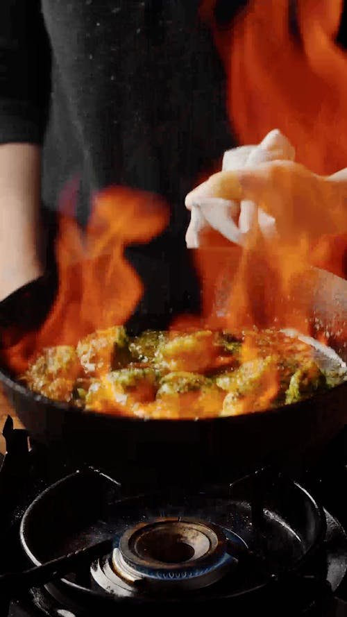 High‑resolution cooking footage showing a colorful, protein‑rich post‑workout meal being prepared, illustrating optimal nutrition after training.